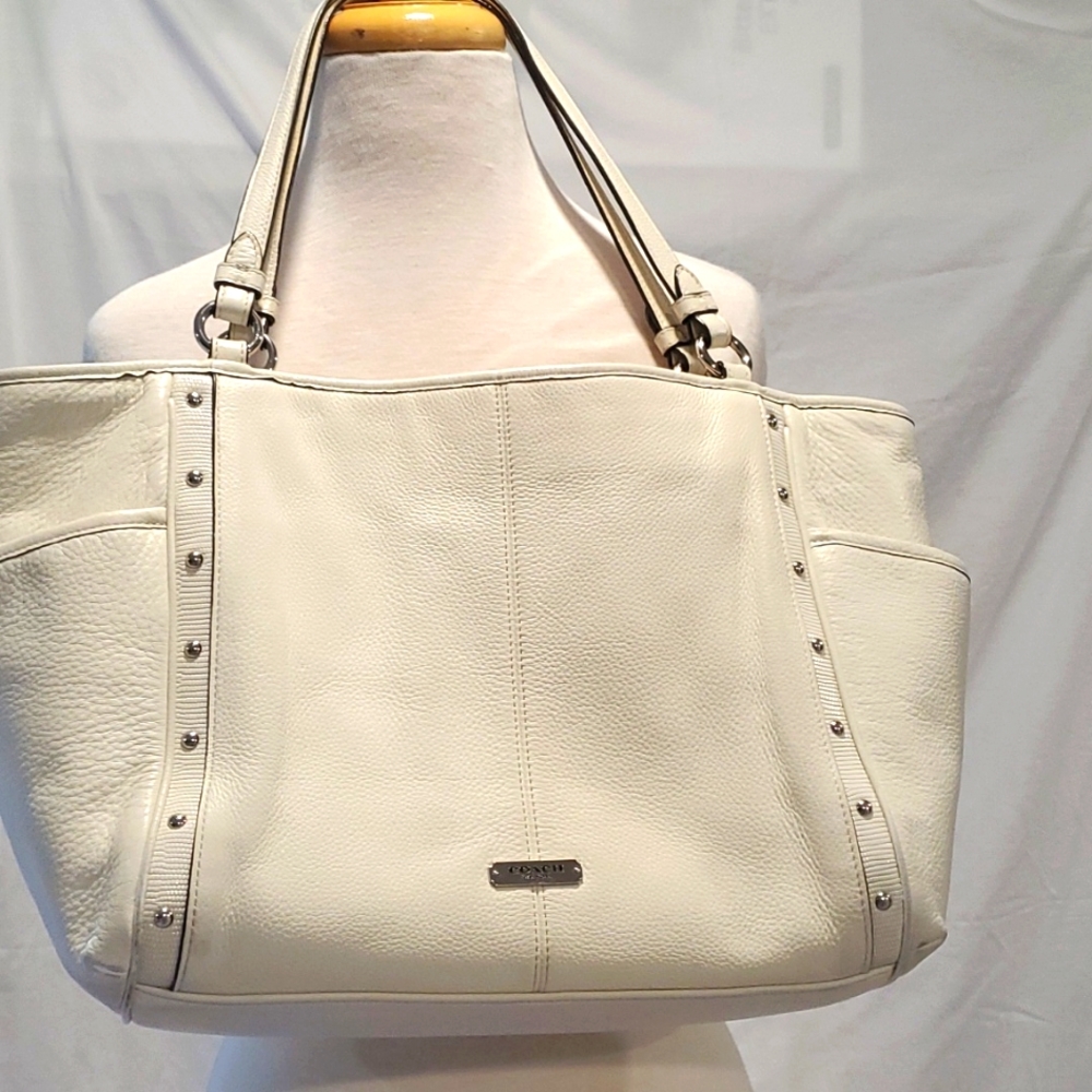 Coach beige  genuine pebbled leather tote purse .
